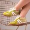 Tenis Centauro para mujer en vinotinto, arena, negro y pistacho